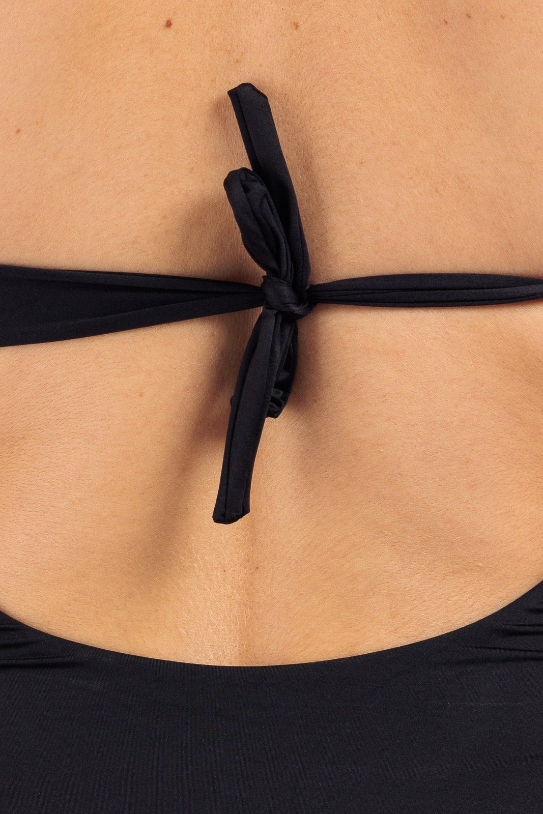 Plain V-Neck Swimsuit by CAPRI LIFESTYLE